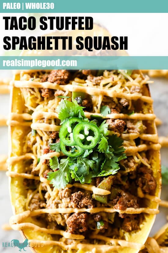 Taco stuffed spaghetti squash with sauce drizzled on top and text at top