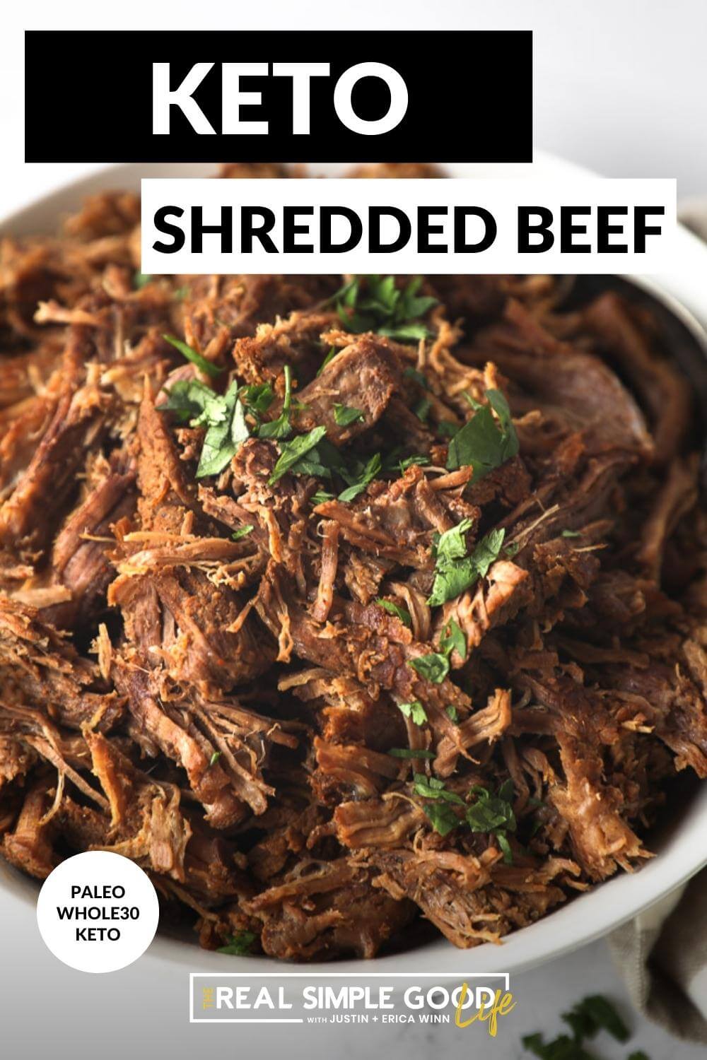 Close up image of shredded beef in a bowl with text overlay at top