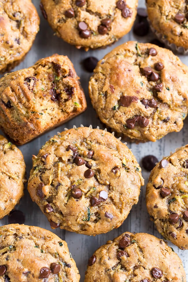 Overhead image of a group of zucchini muffins with chocolate chips